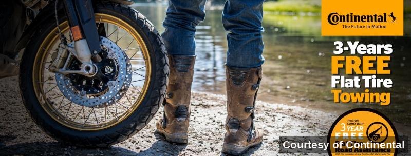 Online ad for three years of free flat tire towing.